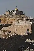 The partially reconstructed mosque, viewed from a distance in 2019