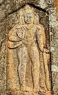 Relief on manastambha outside Parshvanatha Basadi