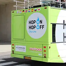 Rear end view of an open-top Myllennium Vyking in Luxembourg, showing the differing rear-end layout of the Volvo B7L chassis used in Europe.