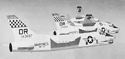 Four Vought F8U-1 Crusader of U.S. Marine Corps Fighter Squadron 312 (VMF-312) "Checkerboards" in flight, 1960