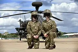 An Army Air Corps aircrew in 2016, wearing the newly issued flying uniform in Multi-Terrain Pattern which replaces the former one-piece flight suit