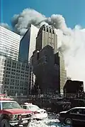 WTC 7 burning behind the Barclay–Vesey Building