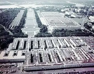 Image 22Westward view from the top of the Washington Monument in 1943 or 1944 during World War II. In the foreground, temporary buildings on the Washington Monument grounds house the Navy's Bureau of Ships. The Main Navy and Munitions Buildings stand to the right of the Lincoln Memorial Reflecting Pool. Temporary buildings to the left of the Reflecting Pool house the Navy's Bureau of Supplies and Accounts. (from National Mall)