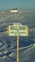 Wall Drug sign in Antarctica – Free Ice Water, 9,333 miles