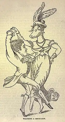 A short, elegantly dressed man dances with a much taller woman with a pig's head