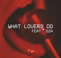 Cover art for "What Lovers Do": a close-up of a person's mouth licking a lollipop