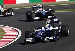 Nico Rosberg and Kazuki Nakajima at 2009 Japanese Grand Prix, 4 October 2009