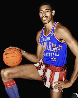 Hall of Fame basketball player Wilt Chamberlain (did not graduate)[87]