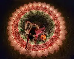 Image 30Woman lighting candles for Diwali, by AjoyDutta1997 (edited by Aristeas) (from Wikipedia:Featured pictures/Culture, entertainment, and lifestyle/Religion and mythology)