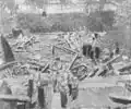Clearing debris at the explosion site