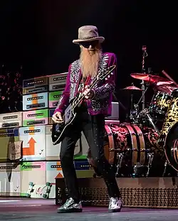 Gibbons performing in 2025