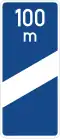 452: Motorway marker (100m before exit)
