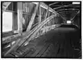 Interior view of double Burr Arches, Kings Posts, and upper truss.