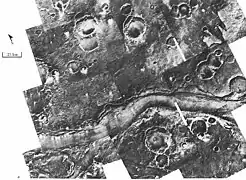 Ares Vallis, as seen by Viking. The channel is 25&nbsp;km (16&nbsp;mi) wide and about 1&nbsp;km (0.62&nbsp;mi) deep.