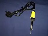 Soldering iron, used to melt solder in electronic work