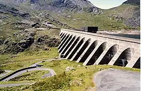 The upper reservoir and dam of the Ffestiniog Pumped Storage Scheme in Wales. The lower power station can generate 360&nbsp;MW of electricity.